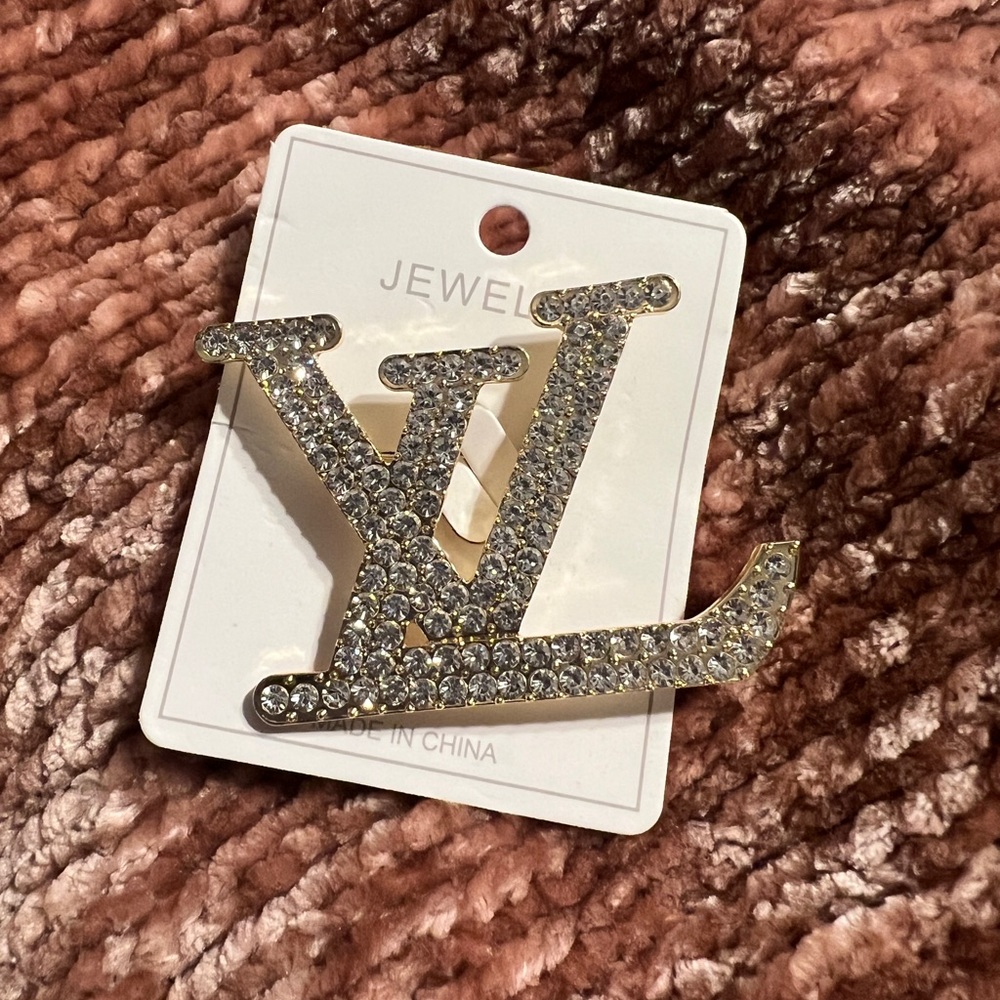 LV Designer, brooch, costume jewelry